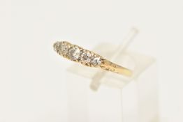 AN EARLY 20TH CENTURY FIVE STONE DIAMOND RING, five old cut diamonds, prong set in yellow metal,
