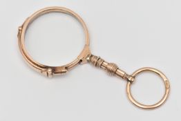 A PAIR OF EARLY 20TH CENTURY LORGNETTE SPECTACLES, double glass lorgnette with yellow metal rim,