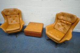 A PAIR OF TANNED LEATHERETTE ROCKING WING BACK ARMCHAIRS, with buttoned head rest, back rest and