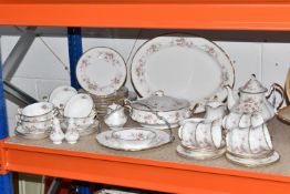 A FIFTY - TWO PIECE SET OF PARAGON 'VICTORIANA ROSE' DINNERWARE AND TEAWARE, comprising a large oval