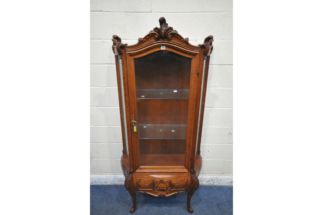 A REPRODUCTION ITALIAN STYLE DISPLAY CABINET, with scrolled crests and mounts, the single arched - Image 1 of 7