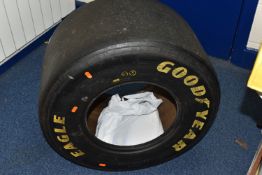 A GOODYEAR EAGLE F1 TYRE, size 26x13, of radial construction, marked for racing purposes only,