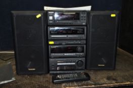A TECHNICS SC-CH700 HI FI WITH MANUAL AND REMOTE, including amp, sound controller, CD, tape and a