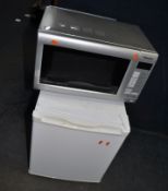 AN ESSENTIAL TABLE TOP FREEZER width 44cm, depth 47cm, height 52cm and a Panasonic microwave (both