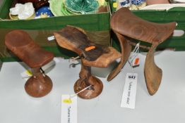 A GROUP OF THREE TURKANA (NORTH WEST KENYAN TRIBE) NECK STOOLS comprising a double-legged,