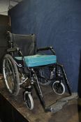 A SOMA WREN 2 FOLDING WHEELCHAIR with two footrests