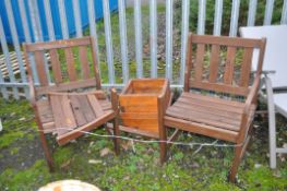 A MODERN WOODEN GARDEN CORNER SEAT, with an angled centre (not fully fixed together) along with a