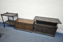 AN OAK MONKS BENCH, with a hinged storage section, width 107cm x depth 44cm x height 74cm, along