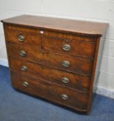 A GEORGIAN FLAME MAHOGANY BOW FRONT CHEST OF TWO SHORT AND THREE LONG DRAWERS, with brass handles,