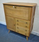 A MID-CENTURY ERCOL STYLE BLONDE ELM BUREAU, with four drawers besides a single cupboard door, width