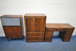 A 1940'S OAK BEDROOM SUITE, comprising a dressing table and tall boy, along with a mid-century