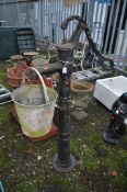 A MID 20th CENTURY CAST IRON WATER PUMP, with foliate detail to top and base sections, height 134cm,