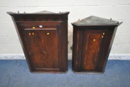 TWO GEORGIAN MAHOGANY CORNER CUPBOARDS, largest width 78cm x depth 39cm x height 110cm, condition