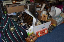 SIX BOXES OF MISCELLANEOUS SUNDRIES, to include over sixty DVDs, silverplate trophies, a three piece