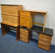 A SELECTION OF PINE FURNITURE, to include three desks/dressing tables and two blanket chests,