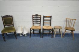 AN ERCOL BLONDE ELM ALL PURPOSE CHAIR, elm stool, three other chairs, oval mirror and two ceramic