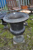 AN EARLY 20th CENTURY CAST IRON GARDEN URN, with fluted bowl and detailed rim, height 70cm