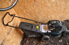 A HAYTER MOTIF 41 PETROL LAWN MOWER with grass box and manual, condition report: minor wear