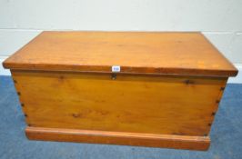 A 20TH CENTURY PINE STORAGE CHEST, with twin metal handles, width 95cm x depth 50cm x height 46cm,