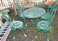 A CAST ALUMINIUM GARDEN TABLE AND FOUR SIMILAR CHAIRS, all overpainted in green, pierced fretwork