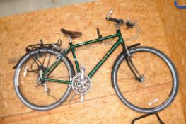 A DAWES SAHARA GENTS MOUNTAIN BIKE, with a 19in frame, 24 speed Shimano gears, rear rack and