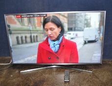 A SAMSUNG UE40MU6470U 40in SMART TV with remote (PAT pass and working)