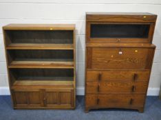 A 20TH CENTURY OAK CABINET, with a detachable glass hide and fall door, atop a base with a fall