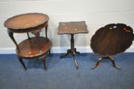 A 20TH CENTURY MAHOGANY TILT TOP TRIPOD TABLE, with wavy edges, diameter 61cm x height 51cm, another