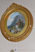 AN EARLY 20TH CENTURY COASTAL LANDSCAPE, a male figure is beside a white cottage which stands on a