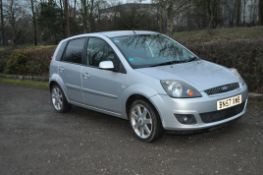 A 2007 FORD FIESTA ZETEC CLIMATE FIVE DOOR HATCHBACK CAR, in silver with a 1242cc petrol engine,