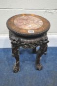 A SMALL CHINESE HUANGHUALI TABLE, with a marble insert, and intricate carved details all over,
