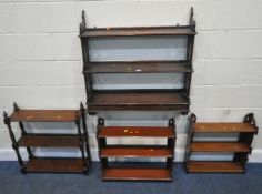 A REPRODUCTION THREE TIER CHIPPENDALE STYLE WALL HANGING SHELF, with three drawers, and blind