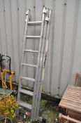 A YOUNGMAN COMBI 200 TRIPLE ALUMINIUM EXTENSION LADDER, with seven rungs to each length, overall 2.