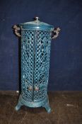 A VINTAGE FRENCH CYLINDRICAL ENAMELLED CAST IRON CONSERVATORY HEATER with coloured glass panels