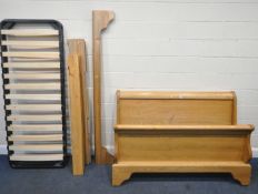 A MODERN ASH 5FT SLEIGH BED, with side rails, slats and bolts, condition report: crack to headboard,