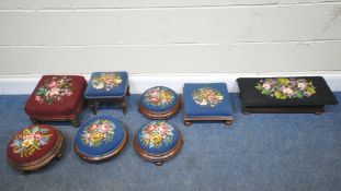 EIGHT SMALL STOOLS, all with needlework upholstery, varying in shape size, colour, design, etc,