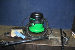 A NUMATIC GVE370 'GEORGE' WET AND DRY VACUUM CLEANER with various accessories