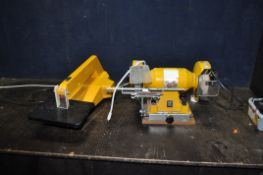 A DECA DYNAMIC SCROLL SAW and a bench grinder (both PAT fail due to uninsulated plugs but both