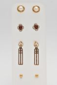 A SELECTION OF EARRINGS, to include a pair of 9ct gold garnet studs, a pair of open work Celtic