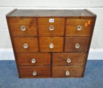 A 19TH CENTURY APOTHECARY CHEST, with ten assorted drawers, width 64cm x depth 25cm x height 62cm,