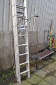 AN ALUMINIUM DOUBLE EXTENSION LADDER, with 15 rungs to each length, and a clima ladder stay (2)