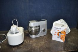 A KENWOOD CHEF TITANIUM KM010 MIXER, with cover but no paddles, a Kenwood mincer attachment (both
