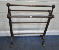 A VICTORIAN MAHOGANY TOWEL RAIL, with five rails, scrolled supports and legs, and tapered