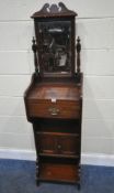 AN EARLY 20TH CENTURY MAHOGANY SHAVING STAND, with a rectangular bevelled edge mirror, a single
