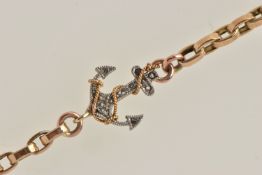 A YELLOW METAL BRACELET, oval link chain bracelet fitted with a central rose cut diamond set