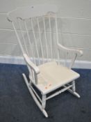 A WHITE PAINTED ROCKING CHAIR, width 60cm x depth 75cm x height 103cm, a pair of folding chairs, and