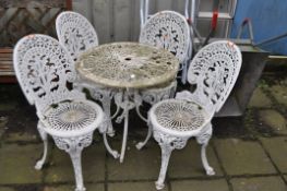 A PAINTED ALUMINIUM CIRCULAR GARDEN TABLE, with open fretwork detail, diameter 69cm x height 64cm,