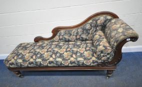 A VICTORIAN ROSEWOOD CHAISE LOUNGE, with a shaped back and scrolled armrests, blue ground and