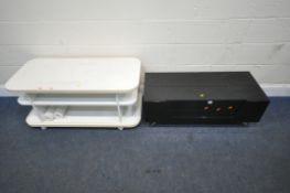 A BLACK GLASS TV STAND, with a fall front door, width 100cm x depth 43cm x height 37cm, along with a
