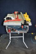 A BOSCH PROFESSIONAL GTS10J SITE SAW with a GTA600 folding stand and accessories (PAT pass and